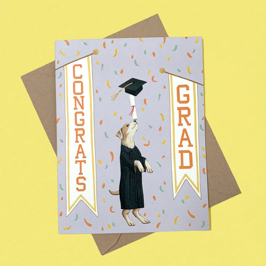 BALANCING DOG - GRADUATION GREETING CARD