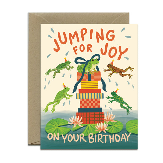 JUMPING FROGS AND GIFTS IN LILY POND - BIRTHDAY GREETING CARD