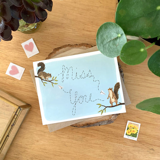 SQUIRRELS AND PAPER AIRPLANES - MISS YOU GREETING CARD