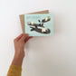 SEA OTTERS WITH CAKE - BIRTHDAY GREETING CARD